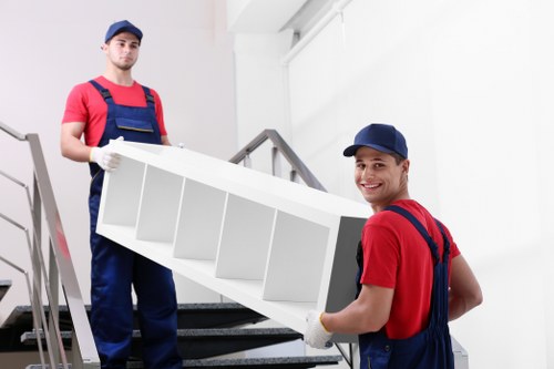 Removal van and moving team preparing a house move in Stockwell