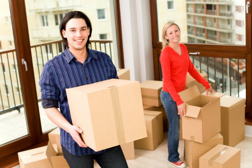 Careful loading of sofas and tables for local furniture removals in Stockwell